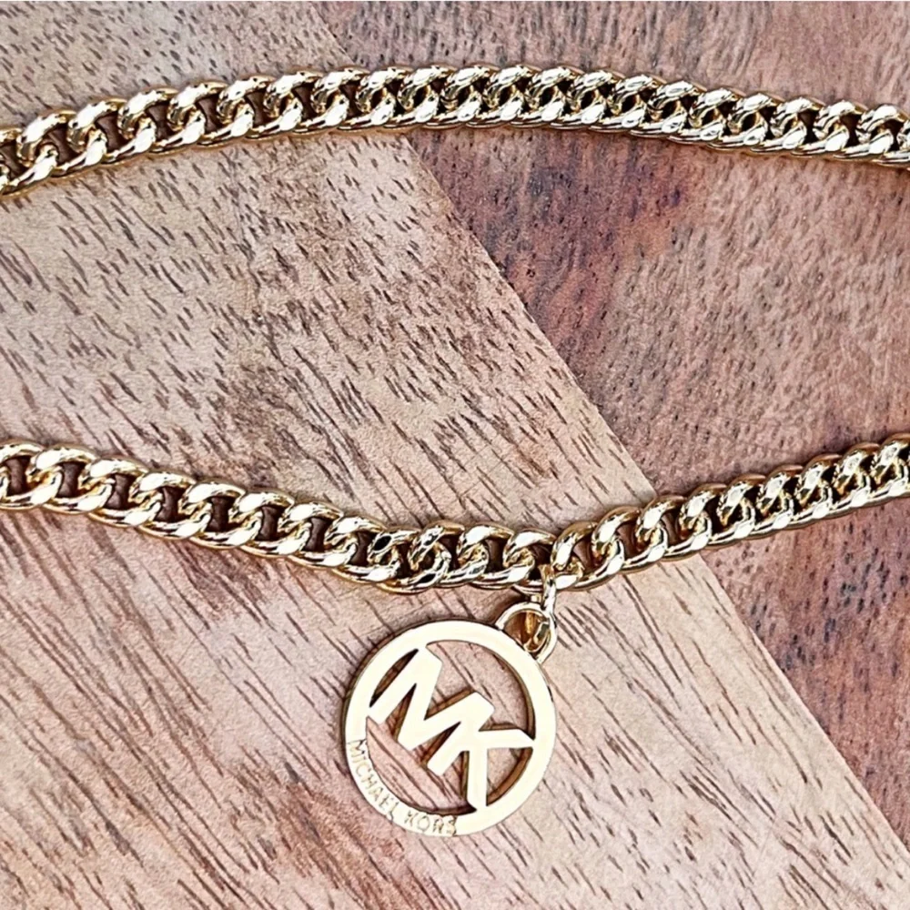 Michael Kors large tassel on chain